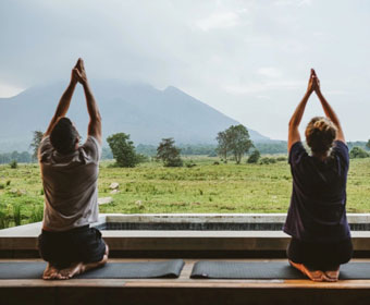 yoga session infront of tranquil mountains